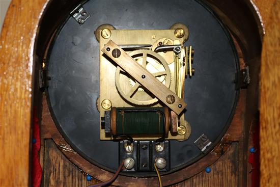 An early 20th century oak cased PUL-SYN-ETIC electric pendulum type impulse master clock and similar slave mantel timepiece, 4ft 4.5in.